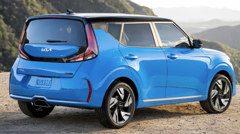 Blue Kia Soul Overlooking Mountains
